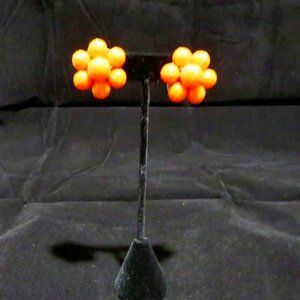 Vintage orange hand beaded clip on earrings